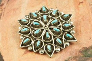 Genuine Sleeping Beauty Turquoise set in Sterling Silver Pendant. Can also be worn as a Brooch. Beautiful Petit Point Design. The Sleeping Beauty Turquoise Mine is located in Gila County, Arizona. Free 18